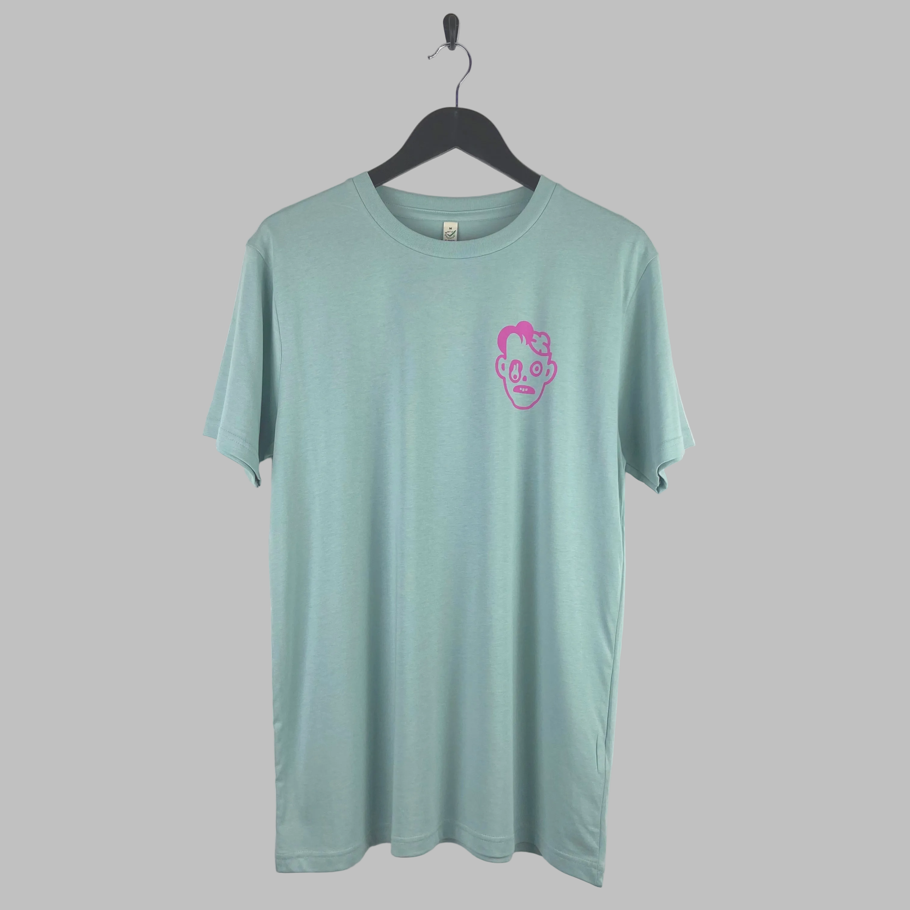 Pink zombie design on a green t-shirt. Limited edition and hand printed in Brighton.